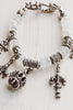 Art Nouveau Moonstone Charm Bracelet with Crown Clasp and Fleur de Lis, Crown and Cross Charms