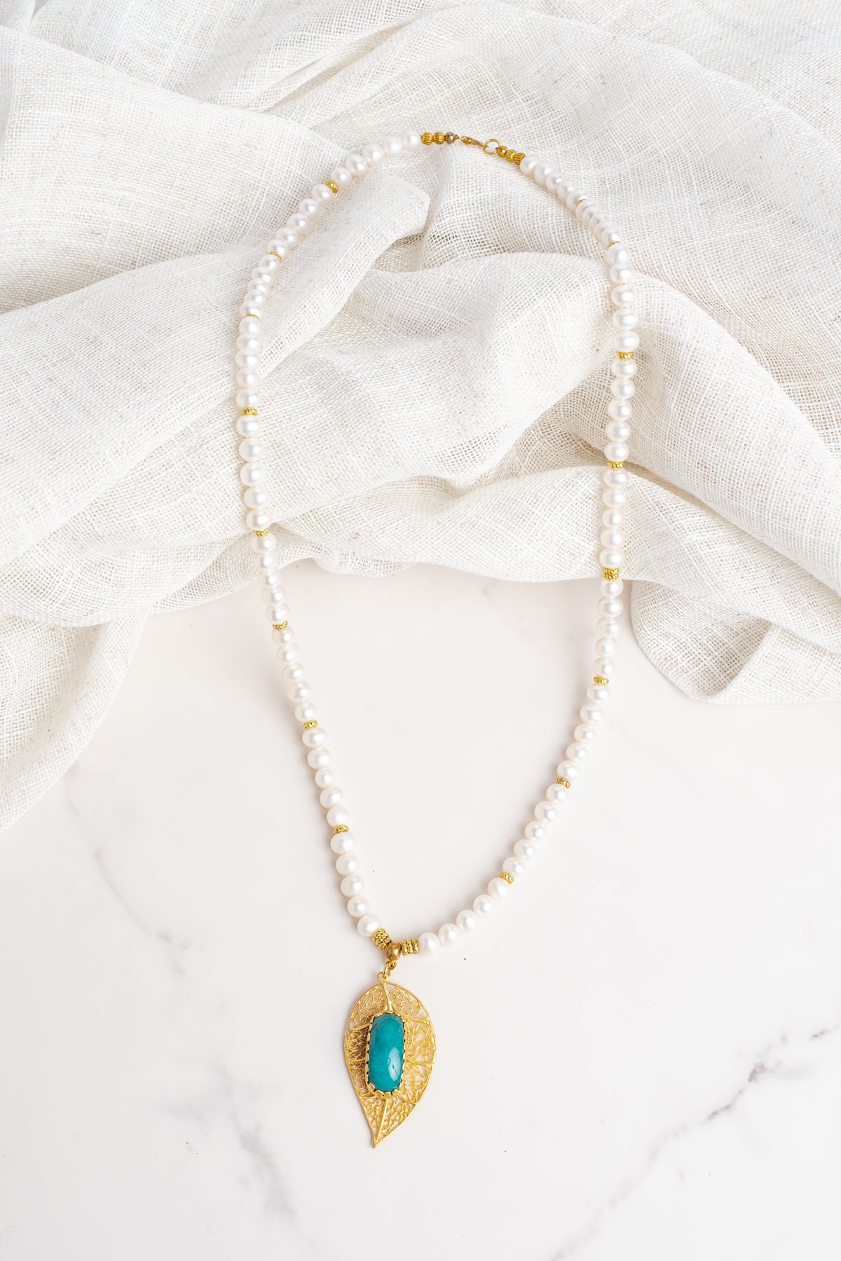 Gold Filligree Leaf with Amazonite Stone Pendant on White Freshwater Pearl Necklace