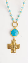 Gold Cross Pendant on a Blue Turquoise Stone Beaded Necklace