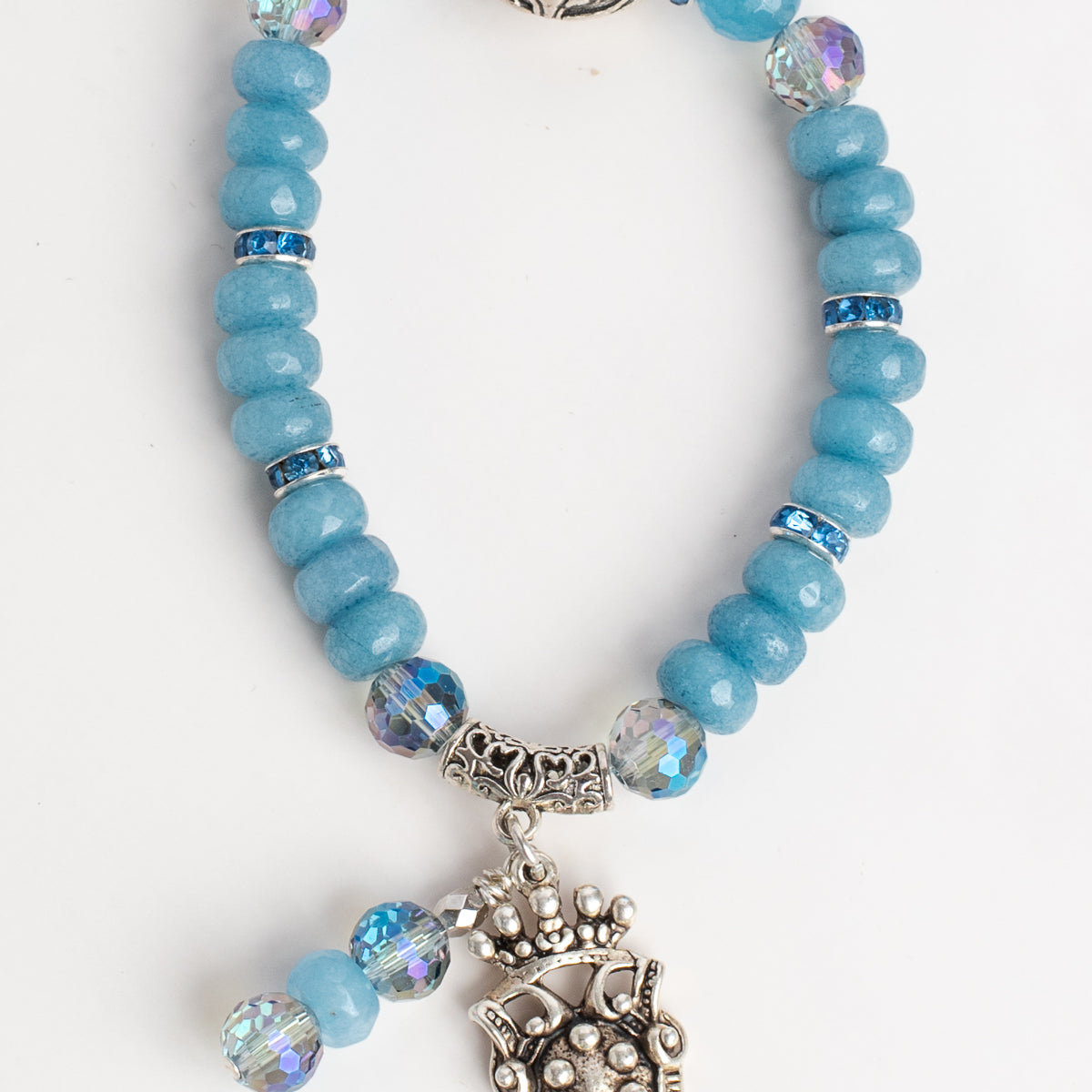 European Style Bead on a Blue Quartz Stretch Bracelet with a Silver Plated French Crown Shield Charm