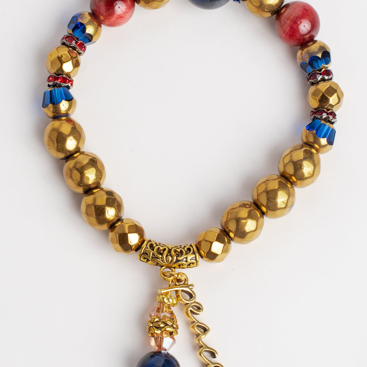 Royal Blue Lapis and Gold plated Hemitite Stone Stretch Bracelet with Gold PEACE Charm