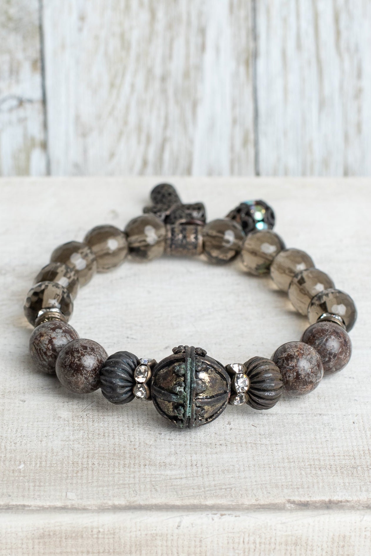Brown Speculed Jasper and Smokey Quartz Gemstone Beaded Stretch Bracelet with Dark Metal Filigree Cross and Rhinestone Charms