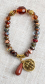 Warm Fall Multi Color Czech Fire Polished Beaded Stretch Bracelet with Gold Cross Charmm and Sandstone Drop