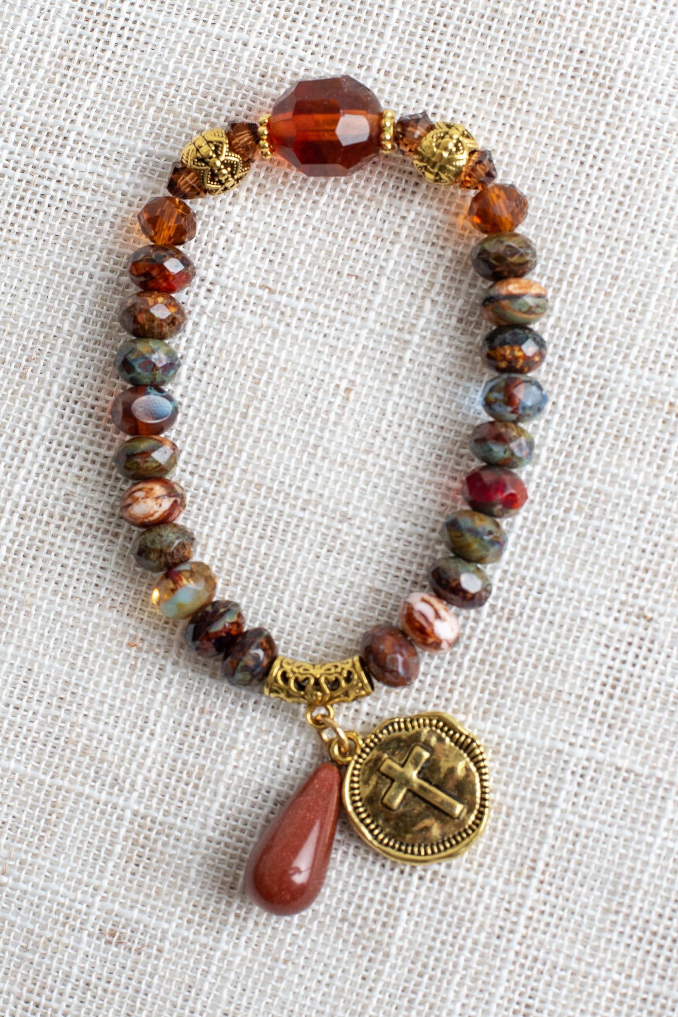 Warm Fall Multi Color Czech Fire Polished Beaded Stretch Bracelet with Gold Cross Charmm and Sandstone Drop