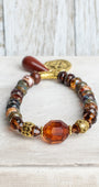 Warm Fall Multi Color Czech Fire Polished Beaded Stretch Bracelet with Gold Cross Charmm and Sandstone Drop