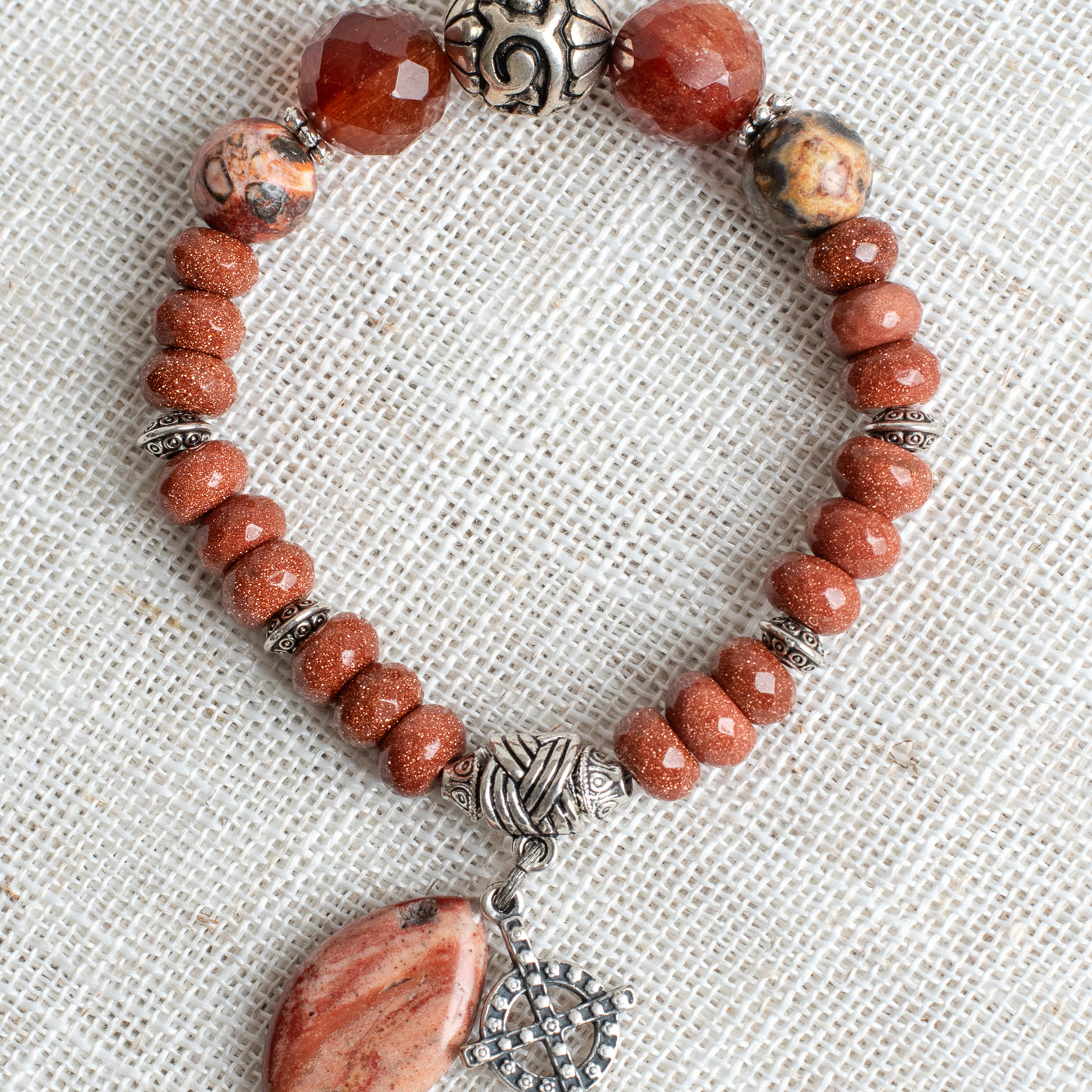 Sunstone Rhondelles with Carnelian Focal Beads Stretch Bracelet with Silver Plated Beads and Cross Charm plus Agate Drop
