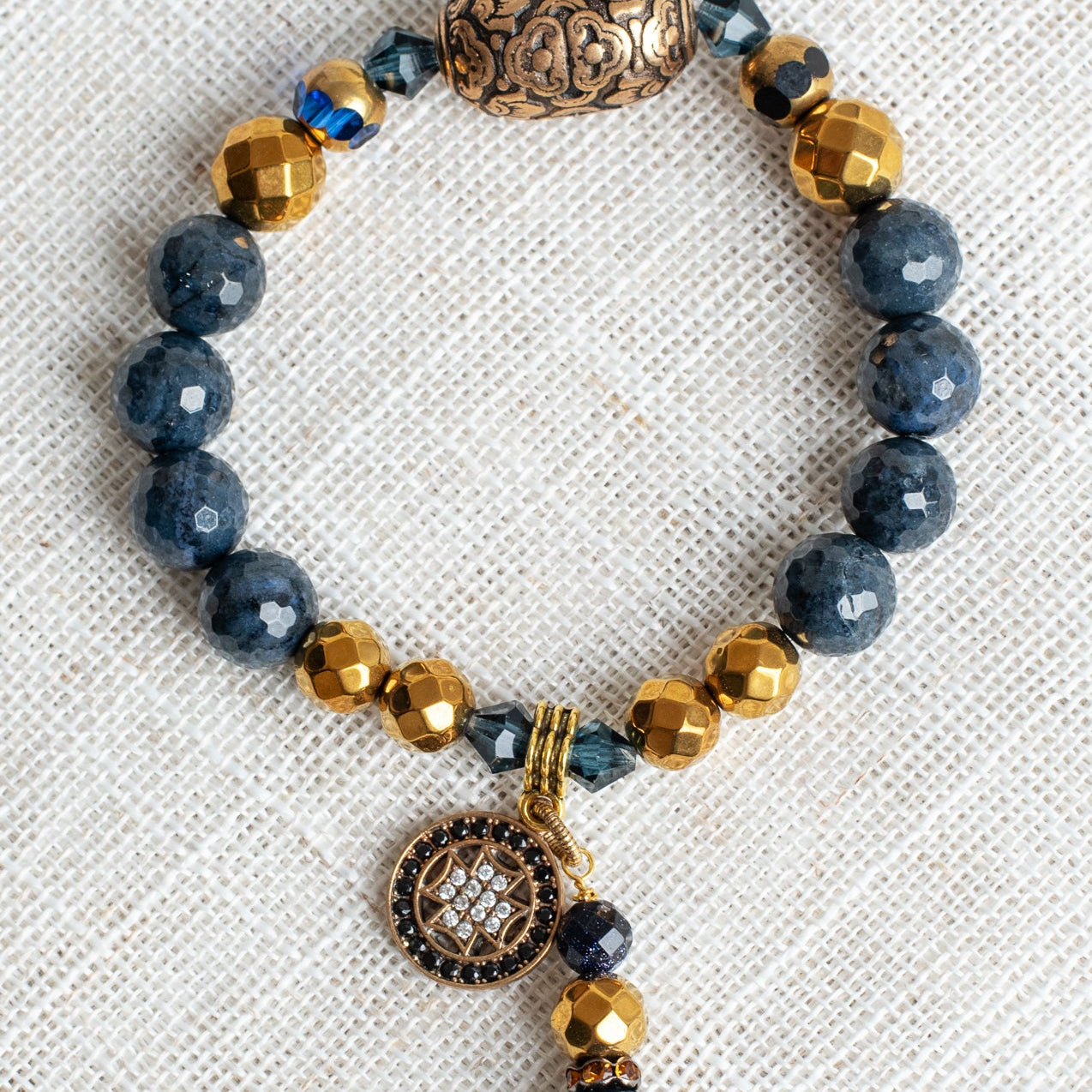 Faceted Dark Blue Sapphire and Dark Gold Hemitite Stone Beaded Stretch Bracelet with Sterling Silver Cross and Stone and Crystal Charm