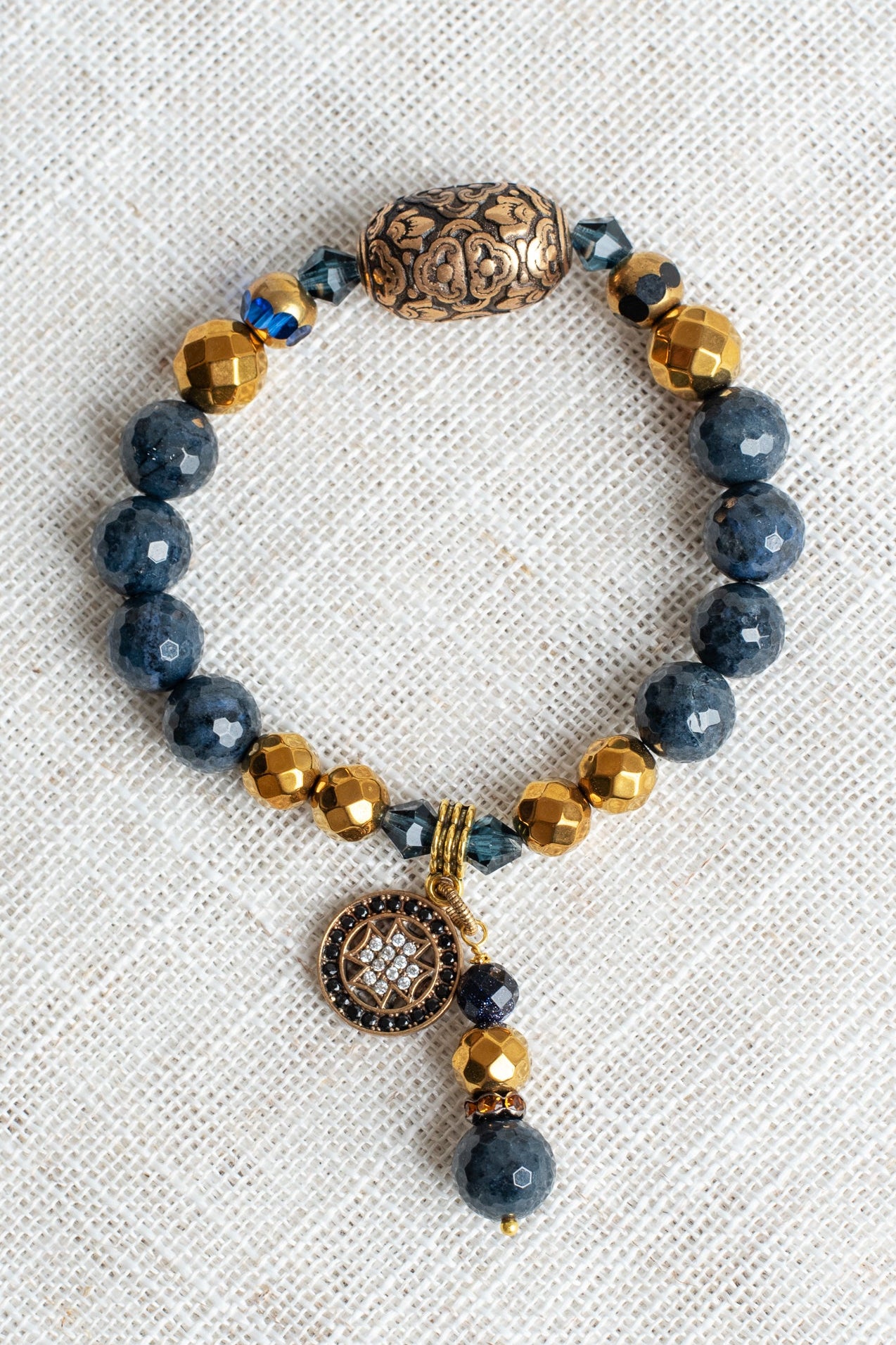 Faceted Dark Blue Sapphire and Dark Gold Hemitite Stone Beaded Stretch Bracelet with Sterling Silver Cross and Stone and Crystal Charm