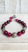 Hot Pink & Burgundy Tiger's Eye Beads with Silver Plated Elements on Stretch Bracelet with Cross and Crystal Charms