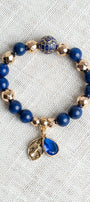 Royal Blue Lapis and Gold plated Hemitite Beaded Stretch Bracelet with Gold Plated Cross Charm and Crystal