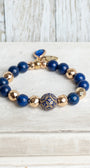 Royal Blue Lapis and Gold plated Hemitite Beaded Stretch Bracelet with Gold Plated Cross Charm and Crystal