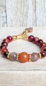 Red and Orange Quartz Gemstone Beaded Stretch Bracelet with Gold Plated Accents and Quartz Cross Charm