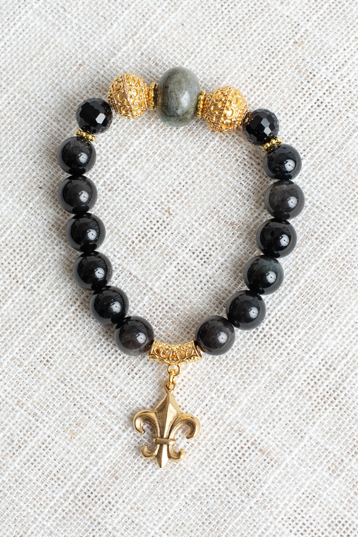 Gold Plated Beads and Fleur De Lis Charm on Obsidian and Labradorite Stretch Bracelet