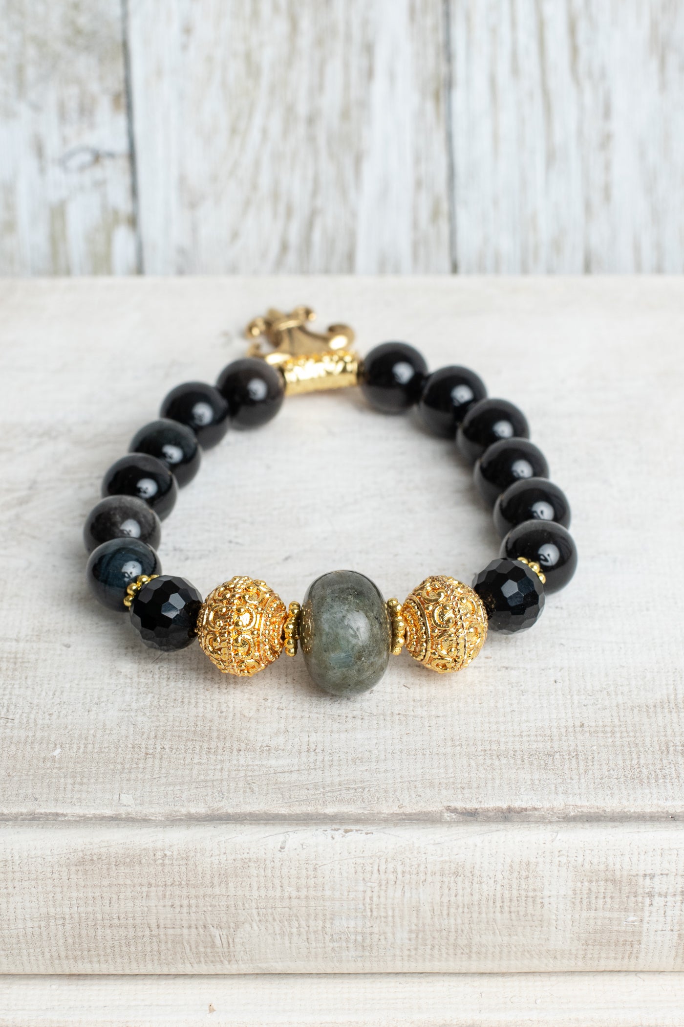 Gold Plated Beads and Fleur De Lis Charm on Obsidian and Labradorite Stretch Bracelet