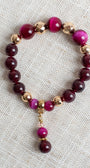 Magenta Tiger's Eye Jasper and Garnet Stone Beads with Gold Plated Elements on a Stretch Bracelet with Matching Beaded Charm