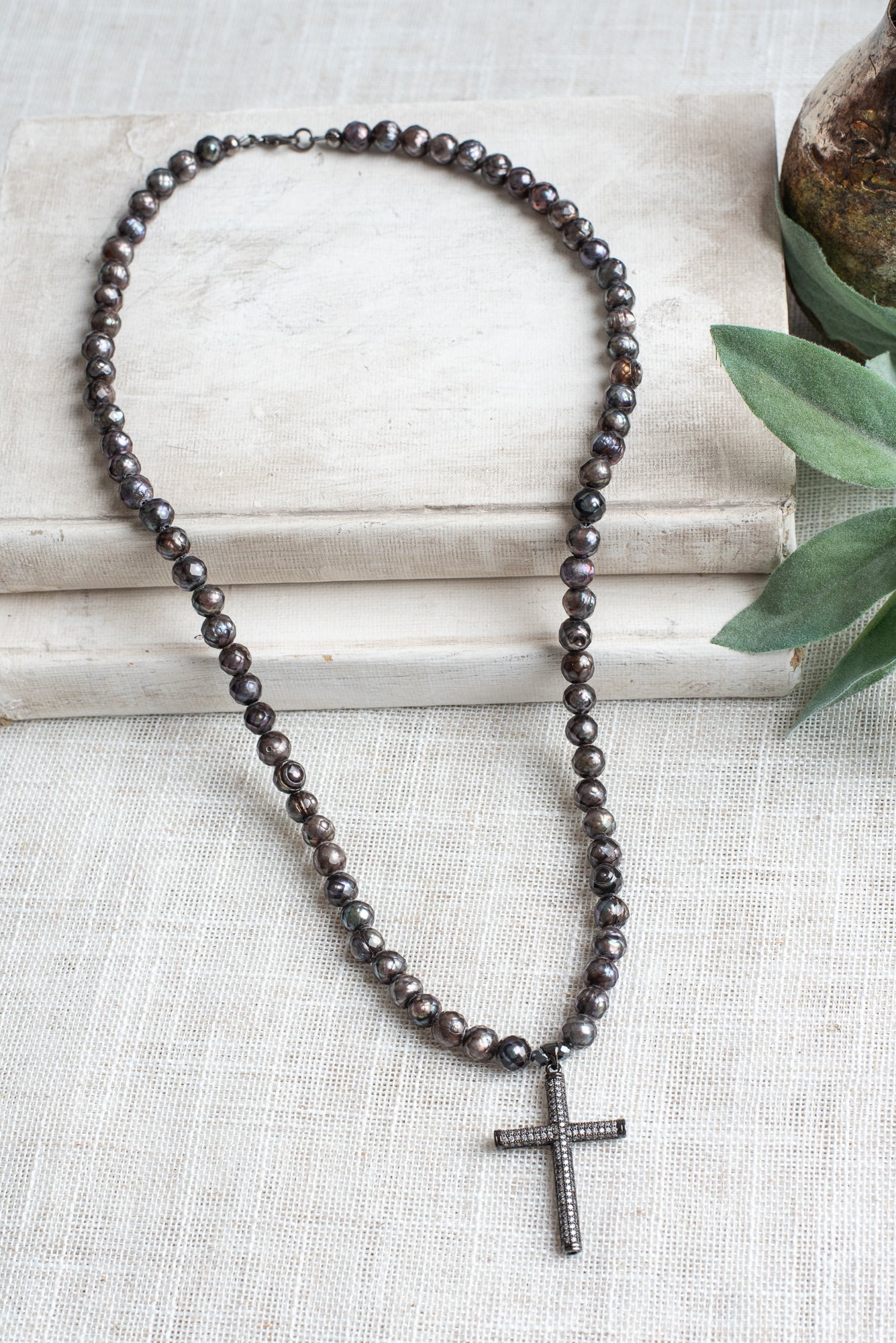 Gunmetal Sterling Silver Micro Pave Modern Cross Pendant on a Faceted Peacock Pearl Strand