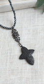 Pavé Black Crystal Cross Pendant on a Faceted Pyrite Beaded Necklace