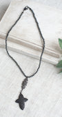 Pavé Black Crystal Cross Pendant on a Faceted Pyrite Beaded Necklace
