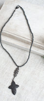 Pavé Black Crystal Cross Pendant on a Faceted Pyrite Beaded Necklace