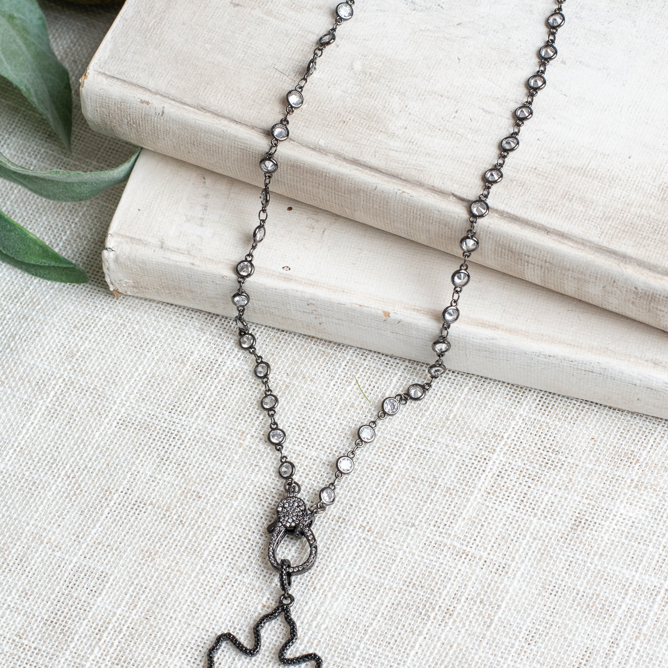 Black Pave Crystal Open Cross on a Hand Soldered Crystal Connector on a Gray AB Crystal Rosary Chain Necklace