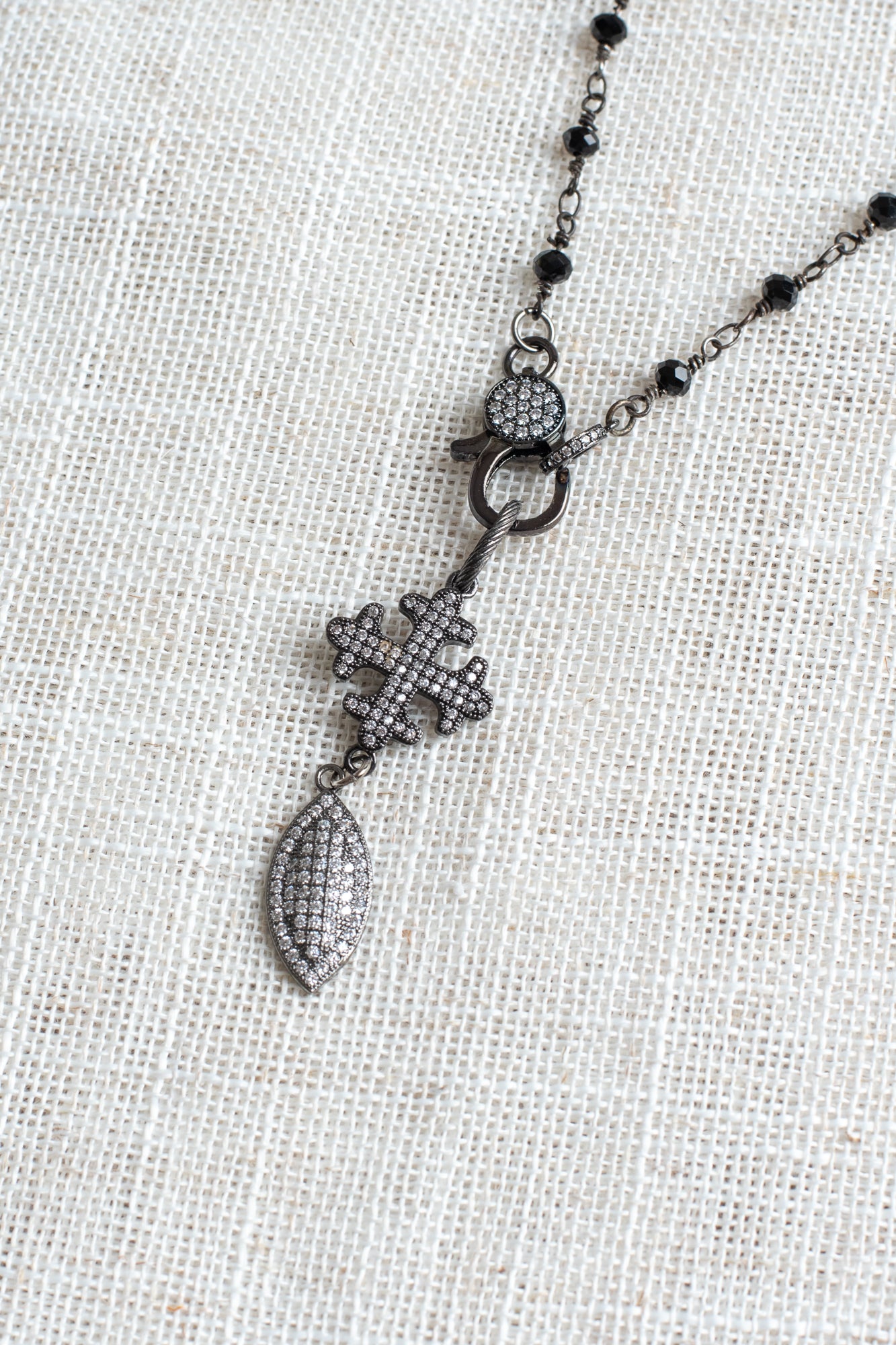 Vintage Style Gunmetal Micro Pavé Clasp, Maltese Cross, and Oval Drop on Black Crystal Rosary Chain Necklace