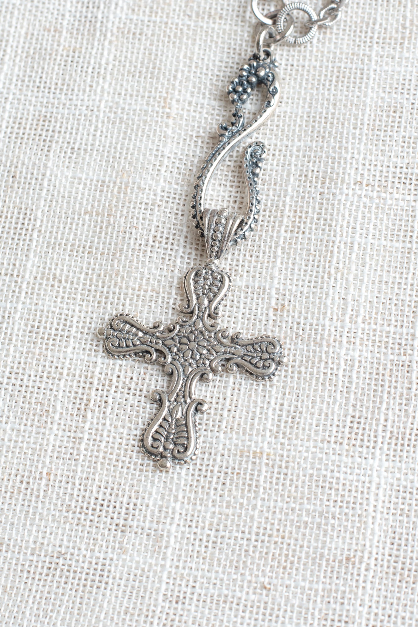 Sterling Silver Ornate Cross on Fancy Figure 8 Drop and Textured Silvertone Chain Necklace