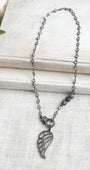 Black Micro Pave Angel Wing Pendant on a White Crystal Gunmeal Station Chain Necklace