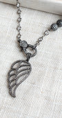 Black Micro Pave Angel Wing Pendant on a White Crystal Gunmeal Station Chain Necklace