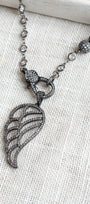 Black Micro Pave Angel Wing on a White Crystal Gunmeal Station Necklace