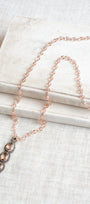 Soft Peach Triple Stone Crystal Silvertone Line Pendant on a Matching Crystal Rosary Chain Necklac