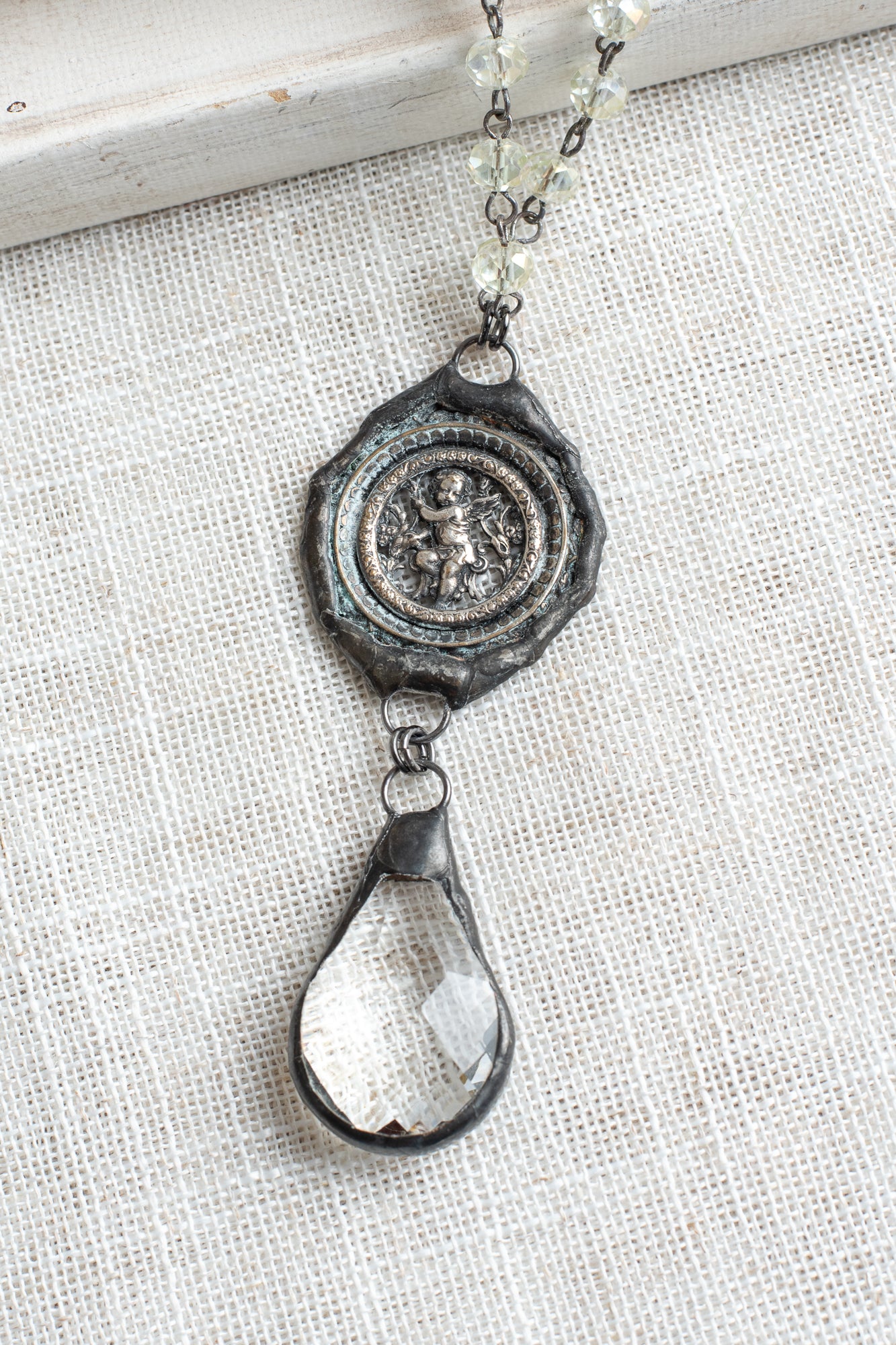 Hand Soldered Antique Silver Cherub Pendant on a Faceted Iridescent Crystal Rosary Bead Necklace