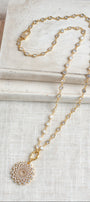 Elegant Gold Plated White Crystal Round Pendant on a Gold Plated Faceted Crystal Station Chain