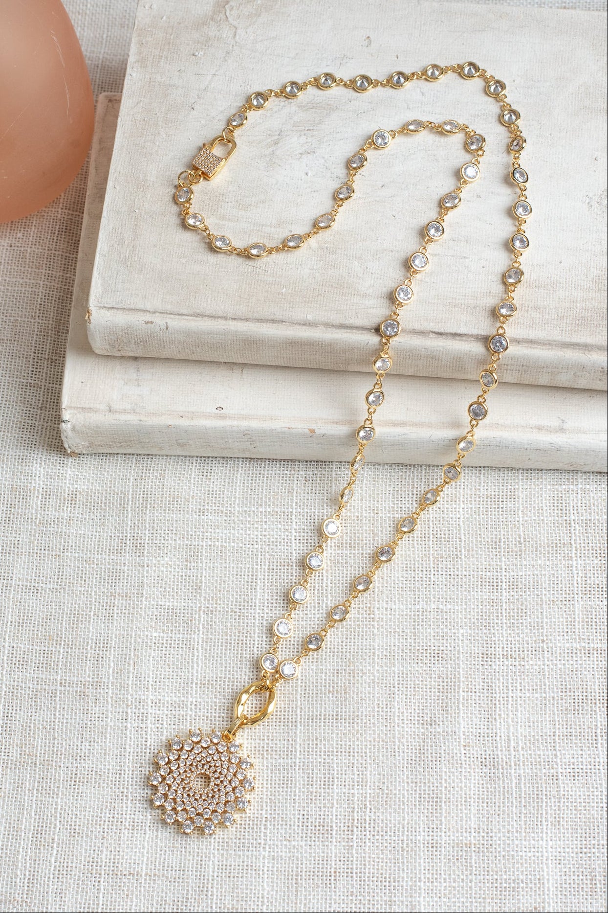 Elegant Gold Plated White Crystal Round Pendant on a Gold Plated Faceted Crystal Station Chain