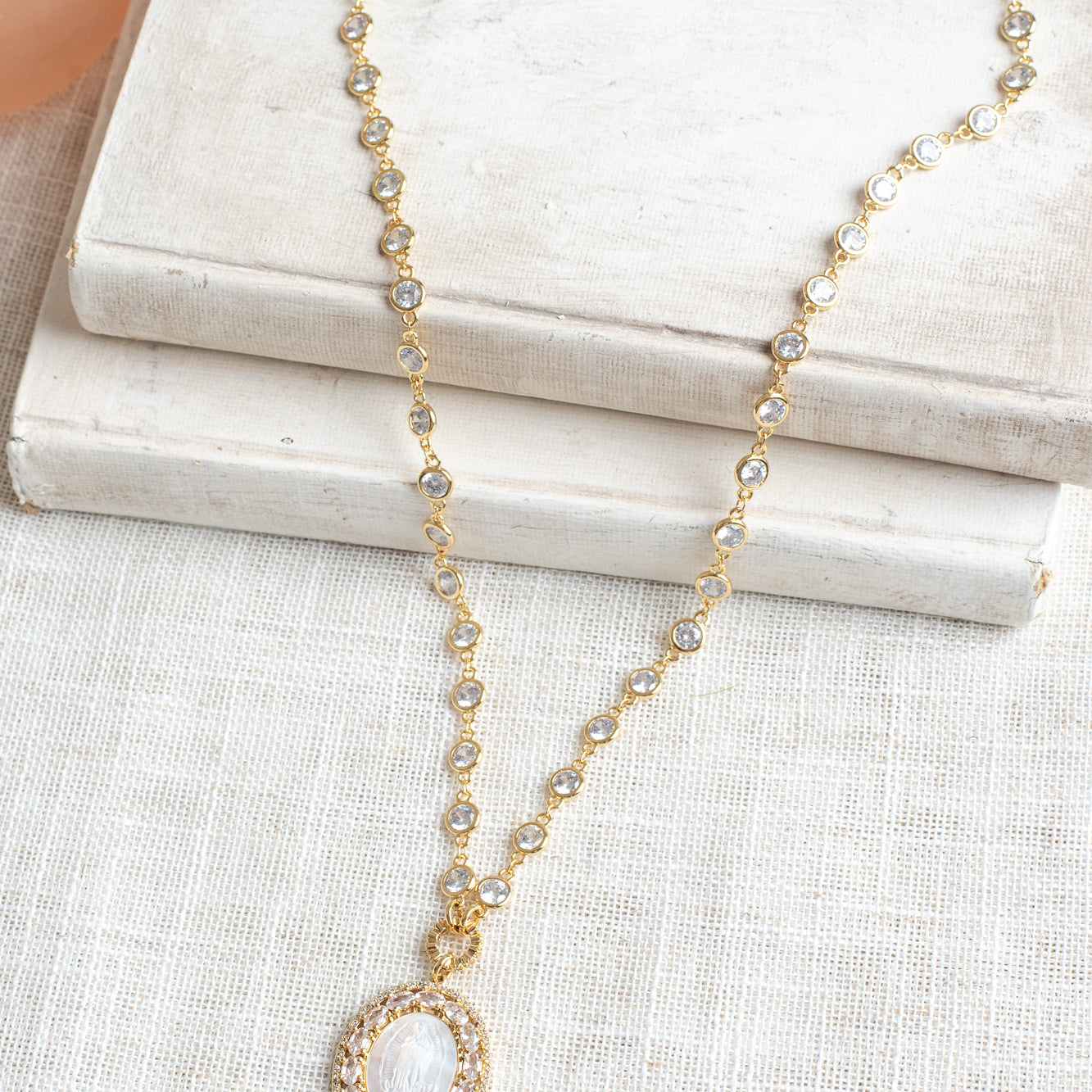 Mother of Pearl Catholic Medal with Crystal Double Halo Pendant on a Gold Plated Clear Crystal Station Chain Necklace