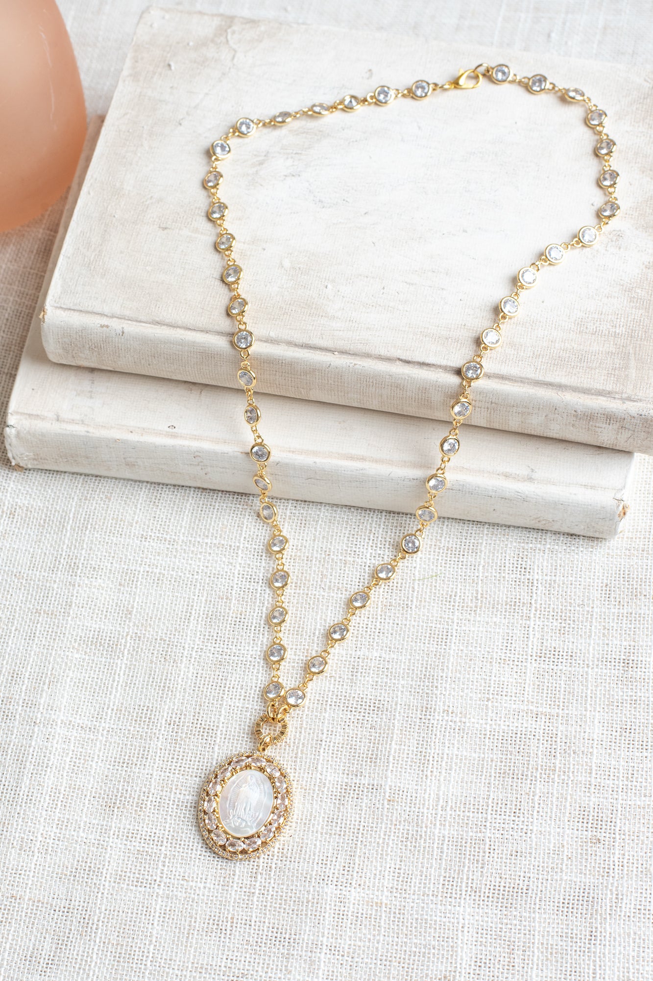 Mother of Pearl Catholic Medal with Crystal Double Halo Pendant on a Gold Plated Clear Crystal Station Chain Necklace