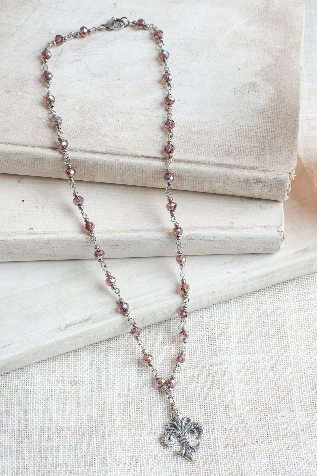 Antiqued Silver Fleur de Lis on a Deep Red AB Crystal and Silver Rosary Chain Necklace
