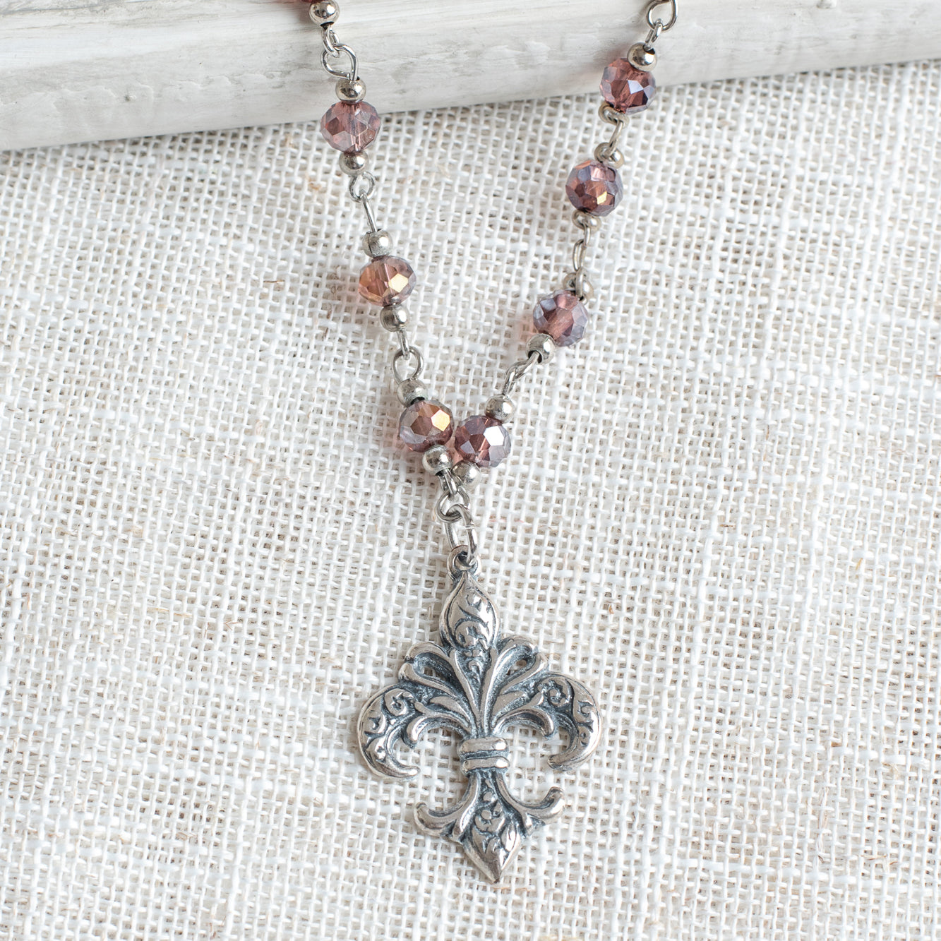 Antiqued Silver Fleur de Lis on a Deep Red AB Crystal and Silver Rosary Chain Necklace