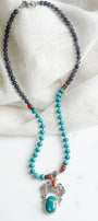 Bold Statement Necklace with Significant Filigree Sterling Silver Turquoise Pendant on a Hand Strung Necklace of Turquoise, Quartz and Carnelian Beads