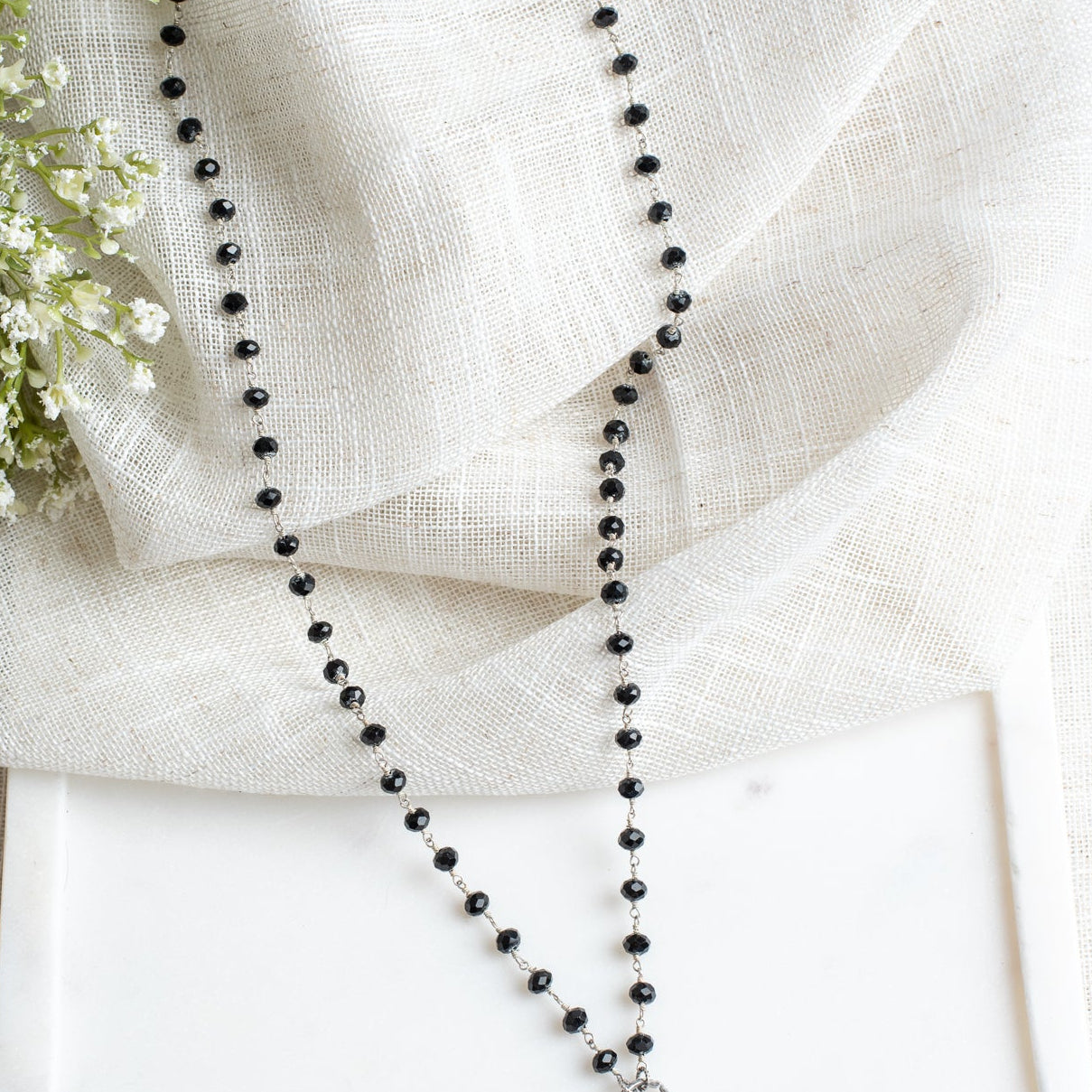 Sterling Silver Shiney Black Agate Cross Pendant on a Black Rosary Bead Necklace