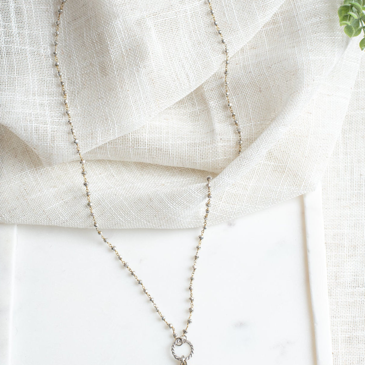 Gold and Silver Cutout Cross Pendant Necklace on Mixed Metal Rosary Chain