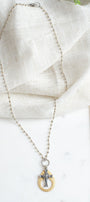 Gold and Silver Cutout Cross Pendant Necklace on Mixed Metal Rosary Chain