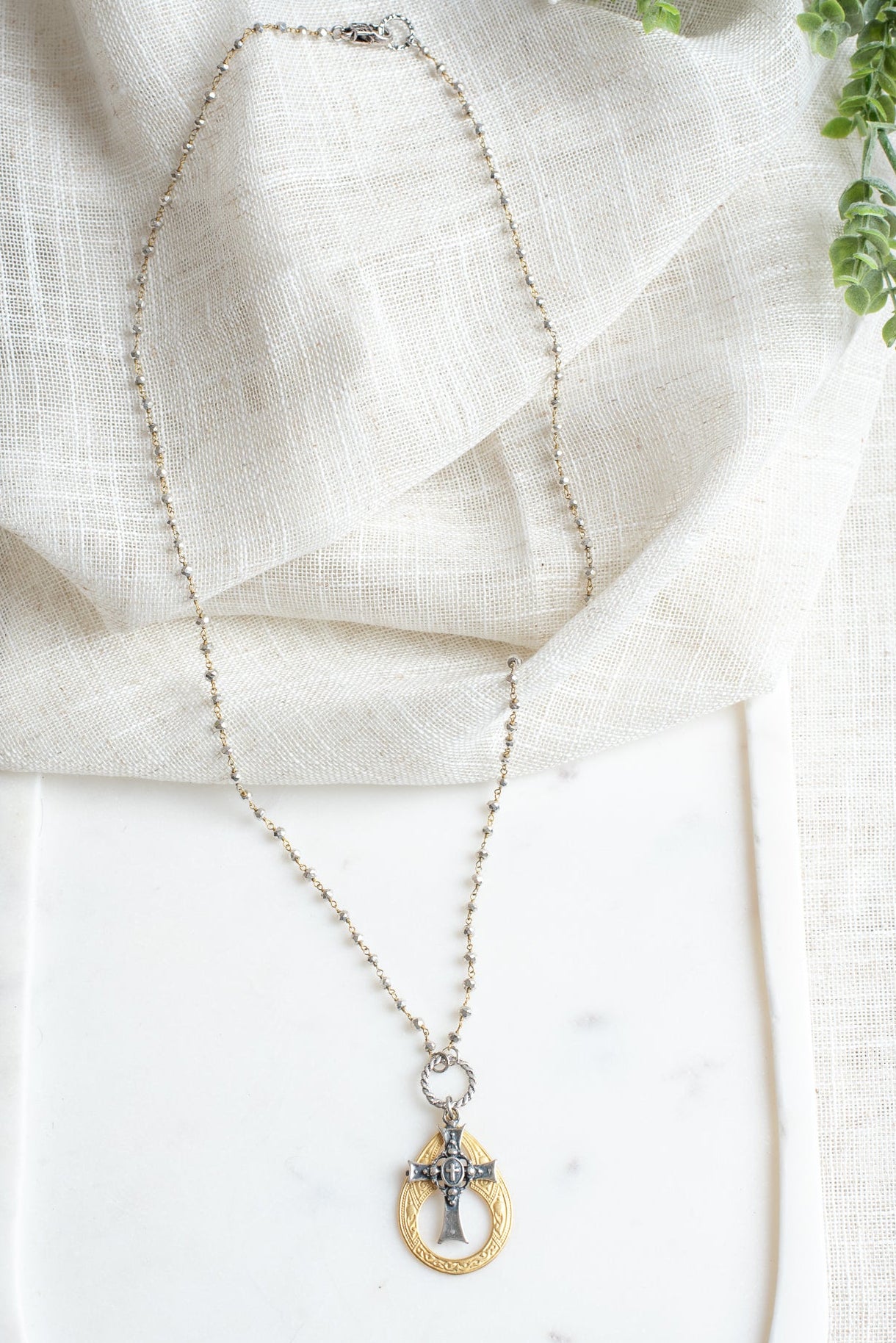 Gold and Silver Cutout Cross Pendant Necklace on Mixed Metal Rosary Chain