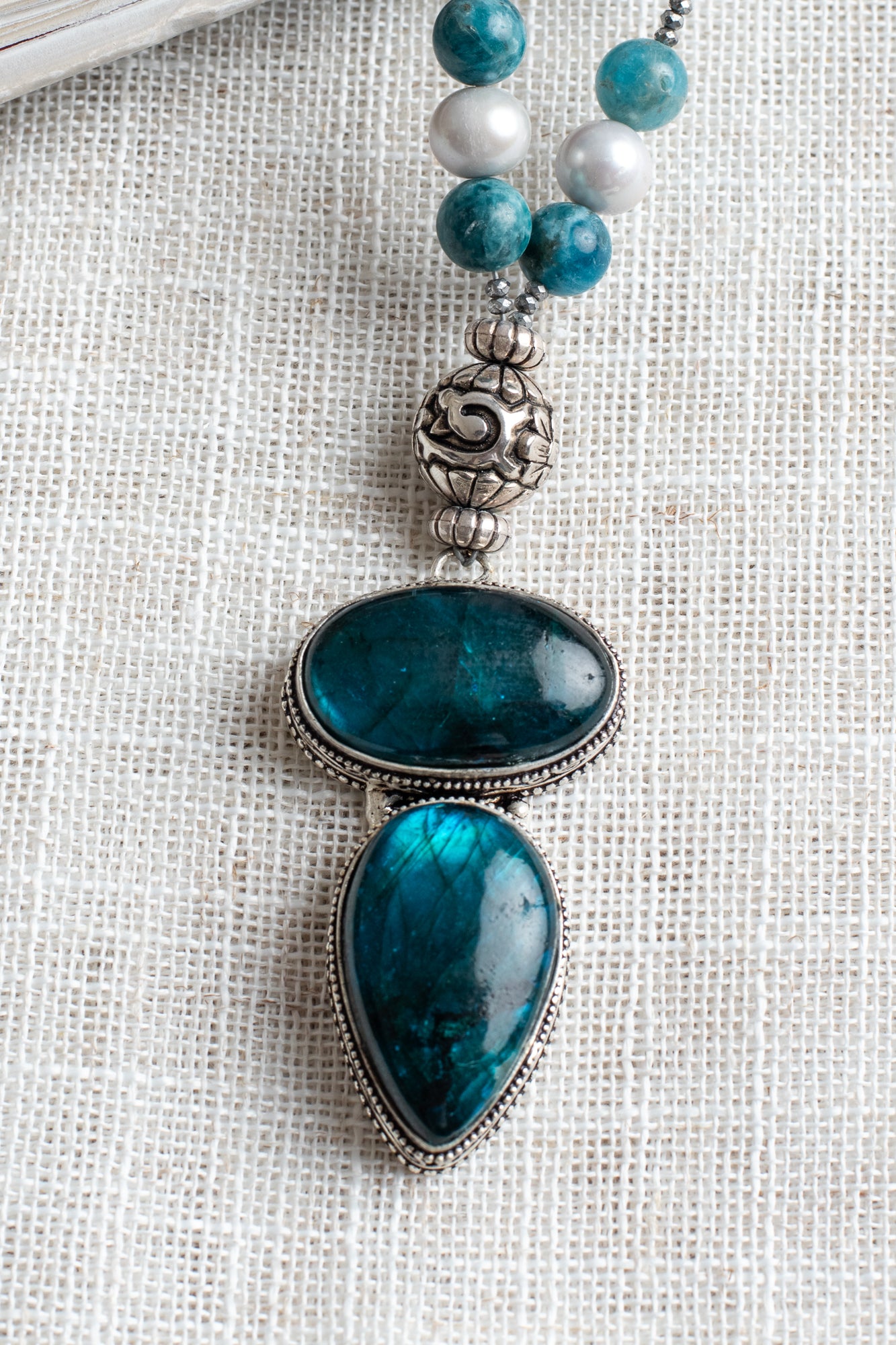 Glowing Sterling Silver Blue Labradorite Pendant on a Hand Strung Strand of Apatite, Pearls, and Hemitite Beaded Necklace