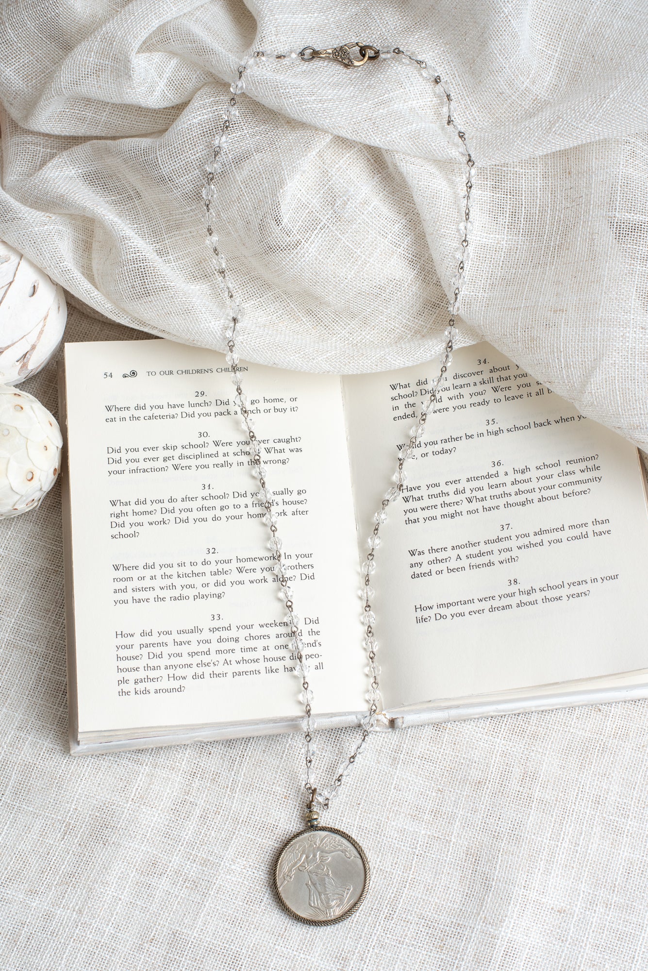 Antique Silver Dollar Coin Replica Bronze Bezel Pendant on a Bronze and Crystal Rosary Chain
