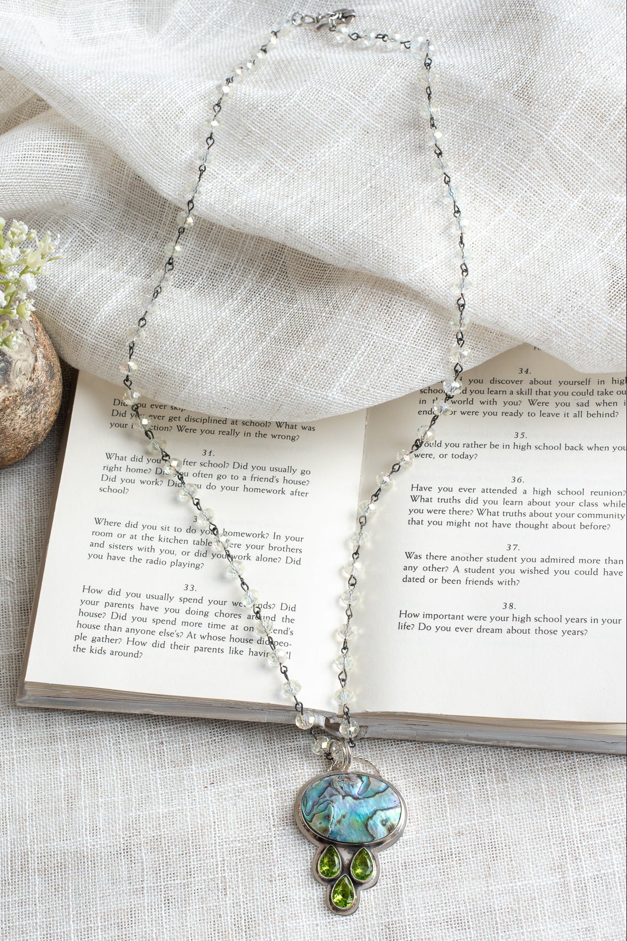 Sterling Silver Multicolor Abalone Pendant with 3 Tear Drop Peridot on a Clear Crysal Rosary Chain