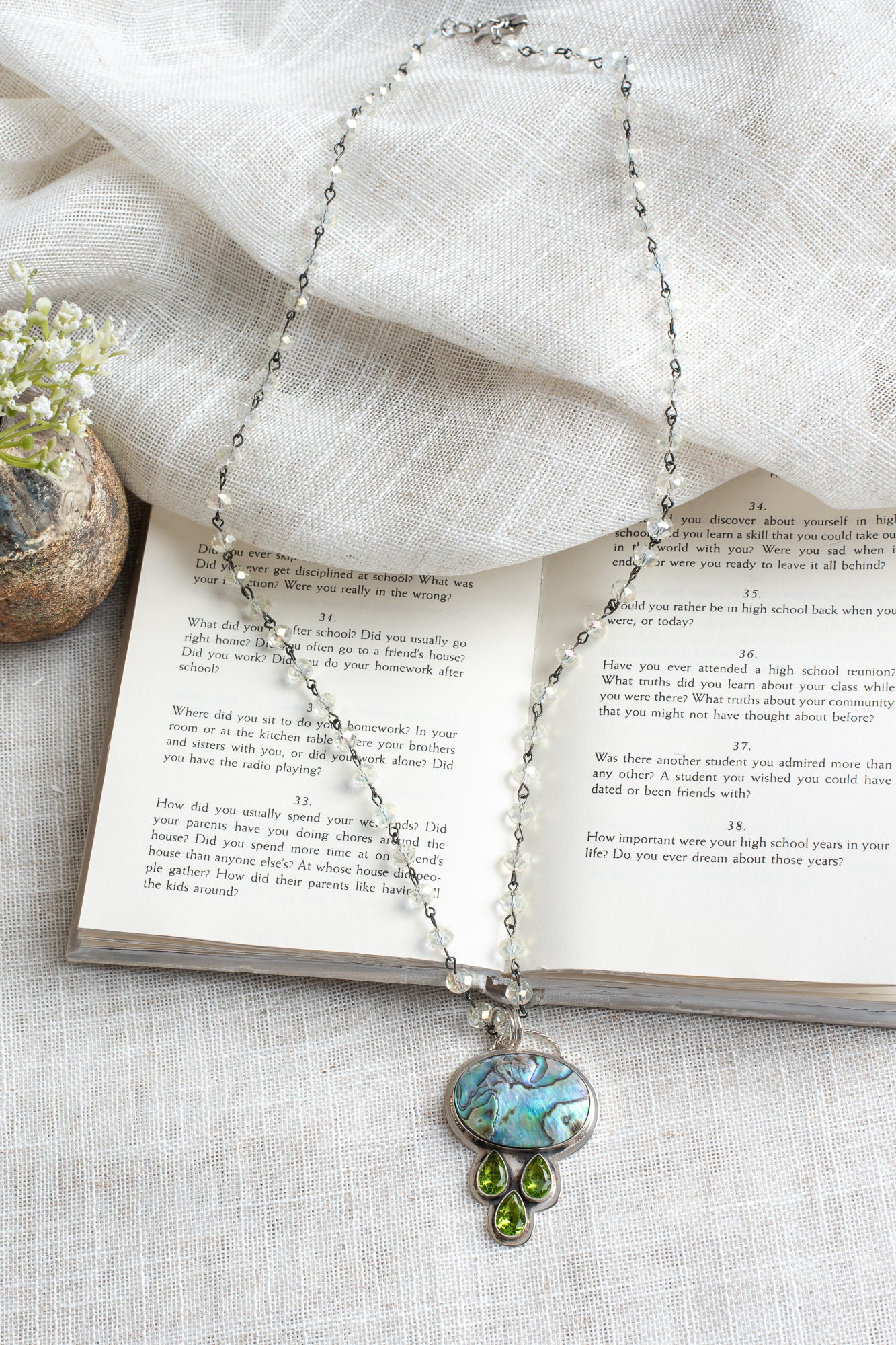 Sterling Silver Multicolor Abalone Pendant with 3 Tear Drop Peridot on a Clear Crysal Rosary Chain