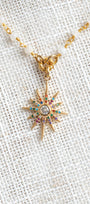 Starburst Pendant on a Moonstone and Gold Rosary Chain Necklace
