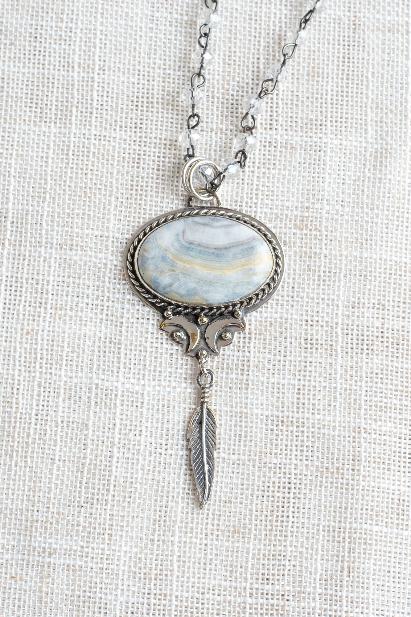 Sterling Silver Gray Opal Stone Pendant with a Feather Charm on a Gray Crystal Gunmetal Rosary Chain Necklace