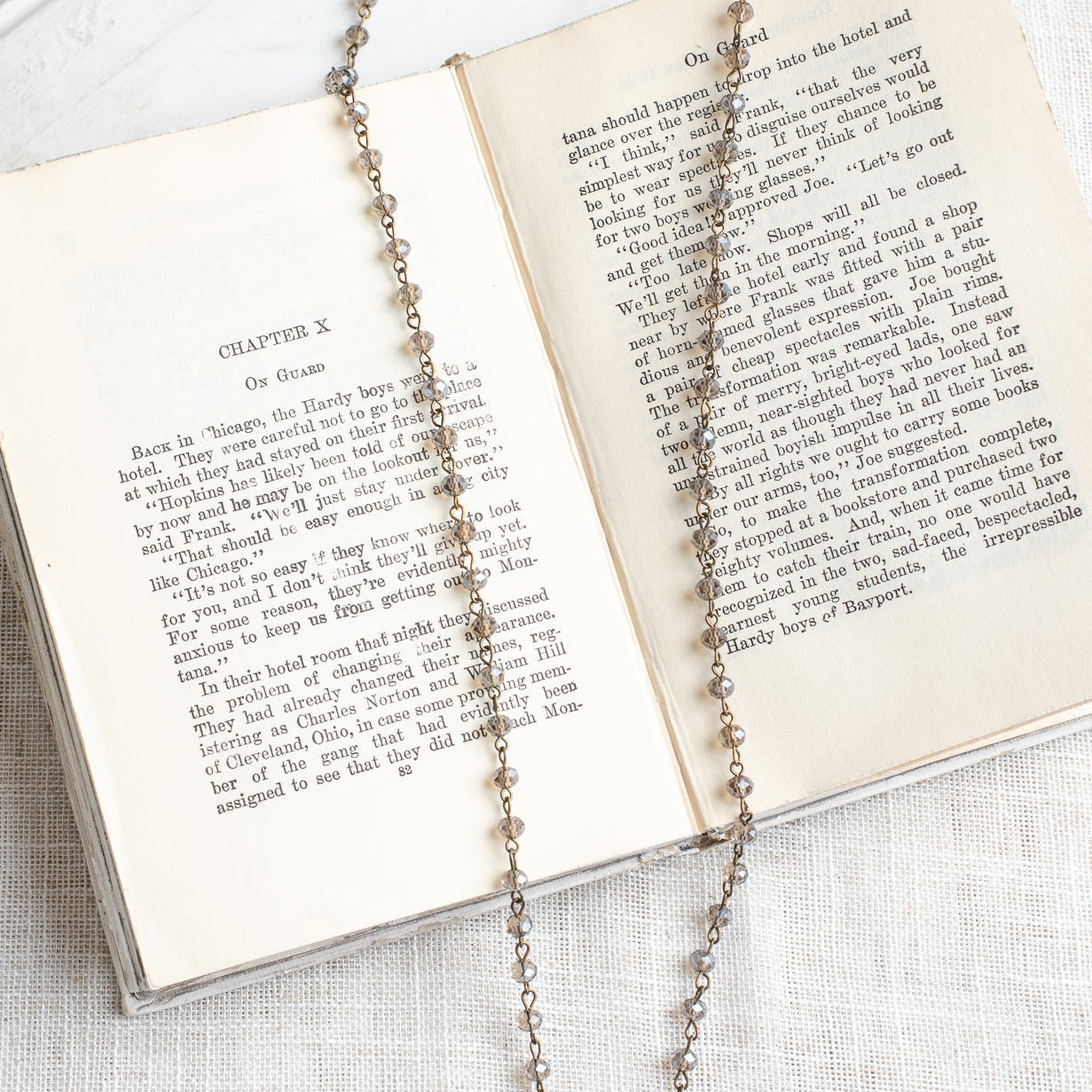 Prague Madonna and Child Catholic Bronze Shield Pendant on a Gray Crystal Rosary Chain Necklace