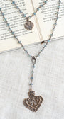 Double Layer Ornate Bronze Heart Pendant with Iridescent Blue Crystal Beads and Catholic Medal Necklace